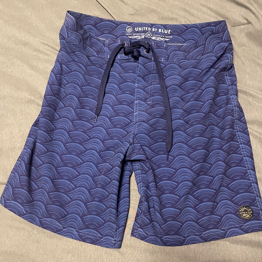 United By Blue Navy Wave Swim Trunks